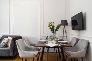 TV a/nebo společenská místnost v ubytování Cracovian Apartment - Loft Affair + 12 fotografií