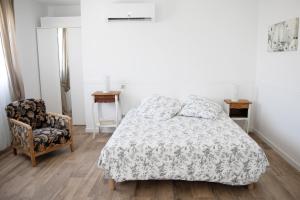 Ένα ή περισσότερα κρεβάτια σε δωμάτιο στο Superbe appartement - L'escapade