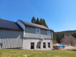 a large building with a bunch of drums at "Huset Alcamaro" in Haugland