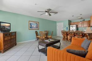 a living room with a couch and a table at Nw Vacation Rental Condo W Pool & Ocean Views in North Wildwood