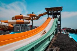 a large water slide on a water park ride at Pensiunea ober in Braşov