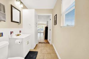 a bathroom with a sink and a toilet at Two Spaces in One Main House and Guest House 25 Min to PCB in Panama City