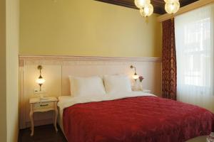 Postel nebo postele na pokoji v ubytování Bursa İpekyolu Hotel