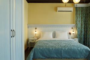 Postel nebo postele na pokoji v ubytování Bursa İpekyolu Hotel