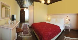 Postel nebo postele na pokoji v ubytování Bursa İpekyolu Hotel