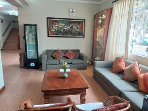 A seating area at Lima Wasi Hotel Miraflores
