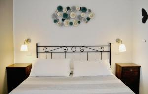 Posteľ alebo postele v izbe v ubytovaní Le Bassotte b&b
