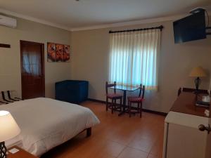 A bed or beds in a room at Lima Wasi Hotel Miraflores