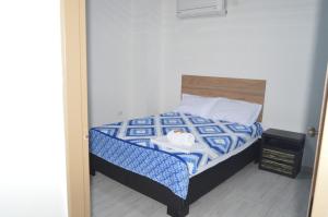 Voodi või voodid majutusasutuse Hotel Real del Valle toas