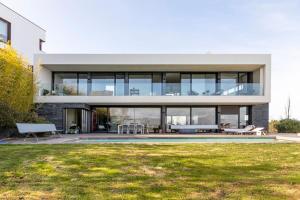 a large house with a pool in front of it at Suite en el Faro de Hondarribia, con vistas in Hondarribia