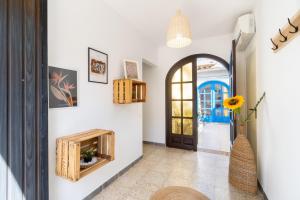 a hallway with a fireplace and a door at Cambrils - 3BR - Beach - Terrace - Wifi - Port Aventura in Cambrils