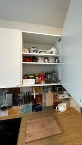 Kuchyň nebo kuchyňský kout v ubytování Japandi apartamentai