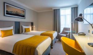 Krevet ili kreveti u jedinici u okviru objekta Maldron Hotel Tallaght