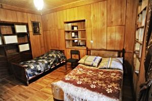 Postel nebo postele na pokoji v ubytování Guest House Gege