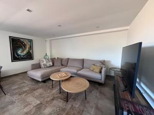 TV a/nebo společenská místnost v ubytování A Xesteira Getaway