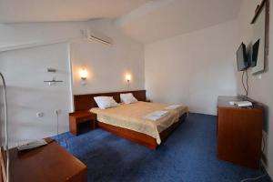 Katil atau katil-katil dalam bilik di Hotel Norcev