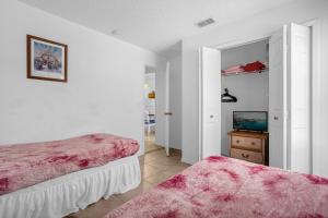 Photo de la galerie de l'établissement 201 Hideaway beach 4 beds - pool&spa, à Kissimmee