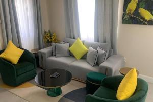 O zonă de relaxare la Welcome to our Ocean View Villa!