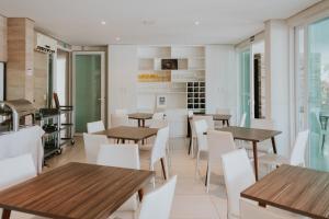 Kuchyň nebo kuchyňský kout v ubytování Wave Suítes Hotel & Lounge bar