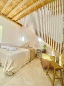 Ένα ή περισσότερα κρεβάτια σε δωμάτιο στο Dee House Sifnos