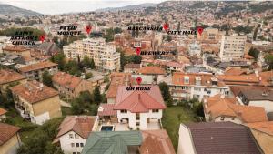 an aerial view of a city with buildings at Guesthouse Rose in Sarajevo