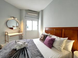 Postel nebo postele na pokoji v ubytování Exclusivo Maria de Molina
