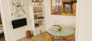 TV a/nebo společenská místnost v ubytování Villa Yandre Garden House - Ayamonte