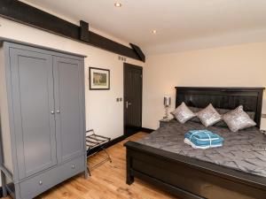 Posteľ alebo postele v izbe v ubytovaní Moor Farm Cottage