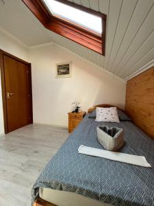 Postel nebo postele na pokoji v ubytování Tang house 唐舍