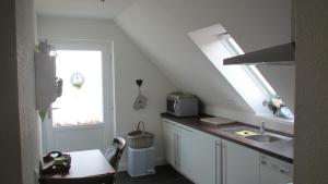 Kuchyň nebo kuchyňský kout v ubytování Ferienwohnung Allegra