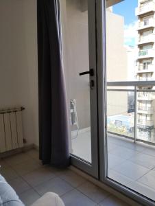 En balkon eller terrasse på Whales&beach II