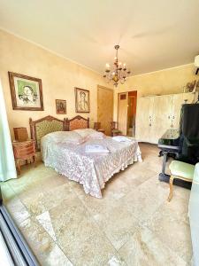 Postel nebo postele na pokoji v ubytování Le due palme Bed & Breakfast