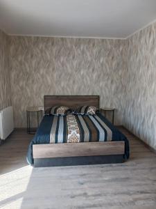 Postel nebo postele na pokoji v ubytování Aquadetente loudeac