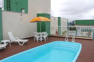 Bazén v ubytování Apartamento Itagua by The Lodges nebo v jeho okolí