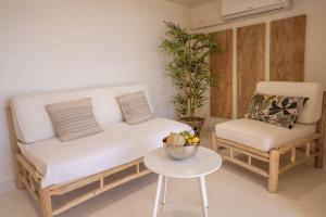 Setusvæði á LES SUITES LOVE 3 SPA VUE MER PISCINe