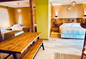 Postel nebo postele na pokoji v ubytování Blumen Hotel