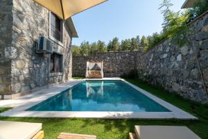 Bazén v ubytování IZZ Getaway - Adults Only nebo v jeho okolí