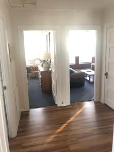 a view of a living room from the hallway at Sandpiper Beachfront Motel in Old Orchard Beach