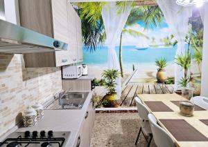 A kitchen or kitchenette at Villa Capriccio