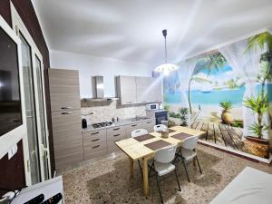 A kitchen or kitchenette at Villa Capriccio