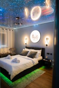 Ένα ή περισσότερα κρεβάτια σε δωμάτιο στο Relaxveld Galaxy