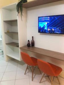 TV a/nebo společenská místnost v ubytování Apartamento completo Ubatuba - Maranduba
