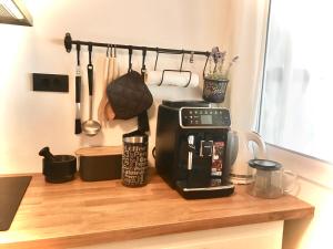 a coffee maker on a counter in a kitchen at beach house in Starigrad