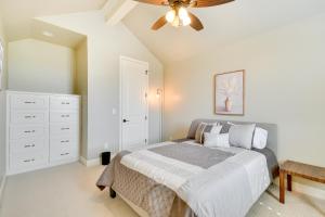 a bedroom with a bed and a ceiling fan at WFH-Friendly Amarillo Home with Furnished Patio! in Amarillo