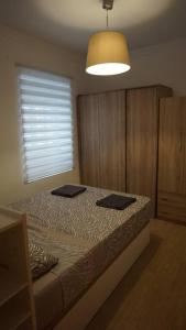 Un pat sau paturi într-o cameră la Casa céntrica con terraza y vistas inigualables