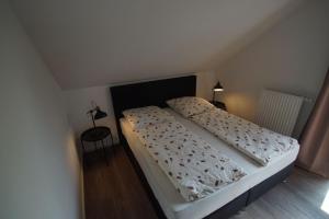 En eller flere senge i et værelse på Luise