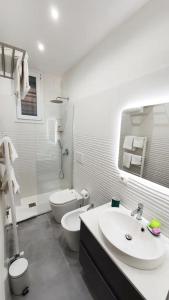Phòng tắm tại Fiera Station Apartment