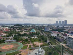 an aerial view of a city with a park at CozyHomes at One Residence Batam in Batam Center