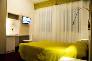 TV a/nebo společenská místnost v ubytování Hotel Da Mario