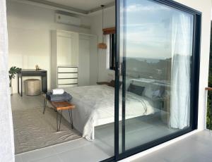 Postel nebo postele na pokoji v ubytování Infinity Villa + 37 fotografií